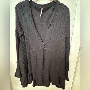 Women’s Free People black baby doll shirt.